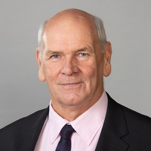 Portrait image of a white male wearing a suit shirt and tie. The man in the photo is Councillor Keith Glazier, Chair of Transport for the South East.